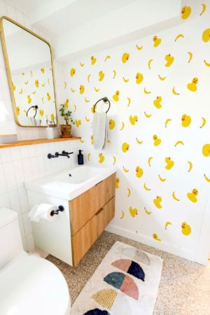 baño papel pintado amarillo pato niño juguete zinzin